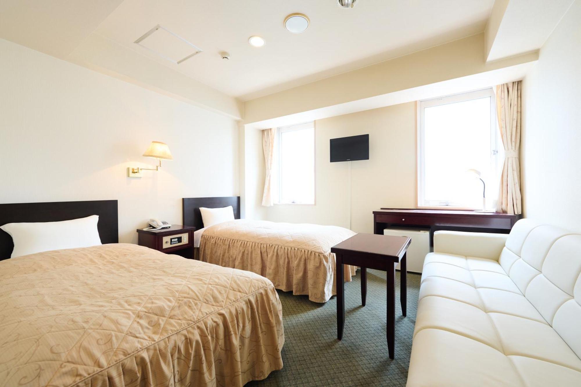 Hotel Sho Sapporo Habitación foto