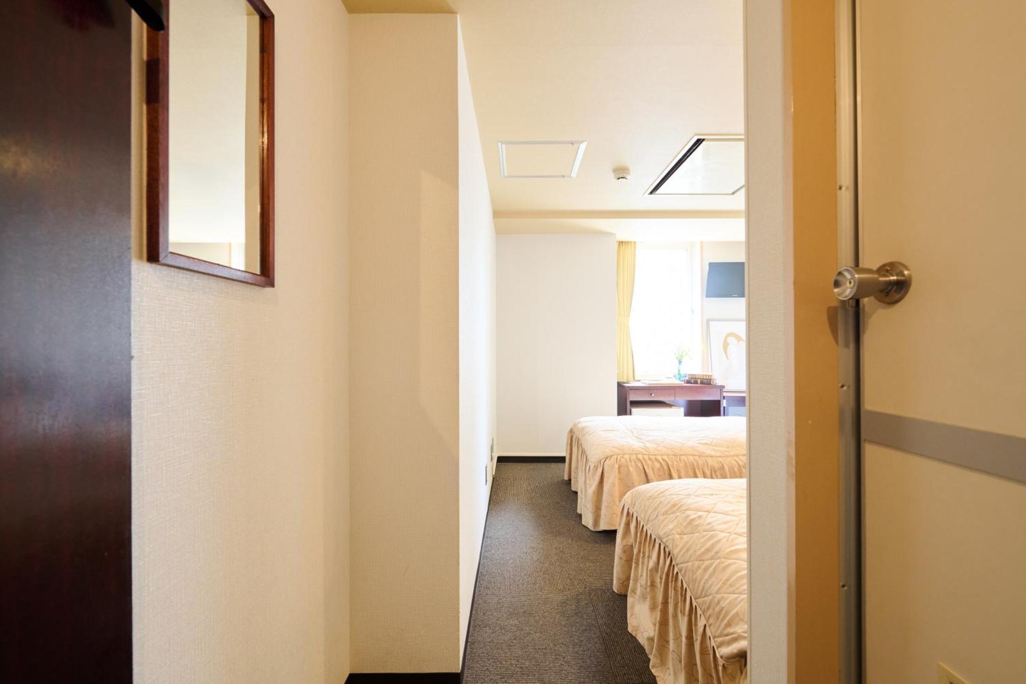 Hotel Sho Sapporo Habitación foto