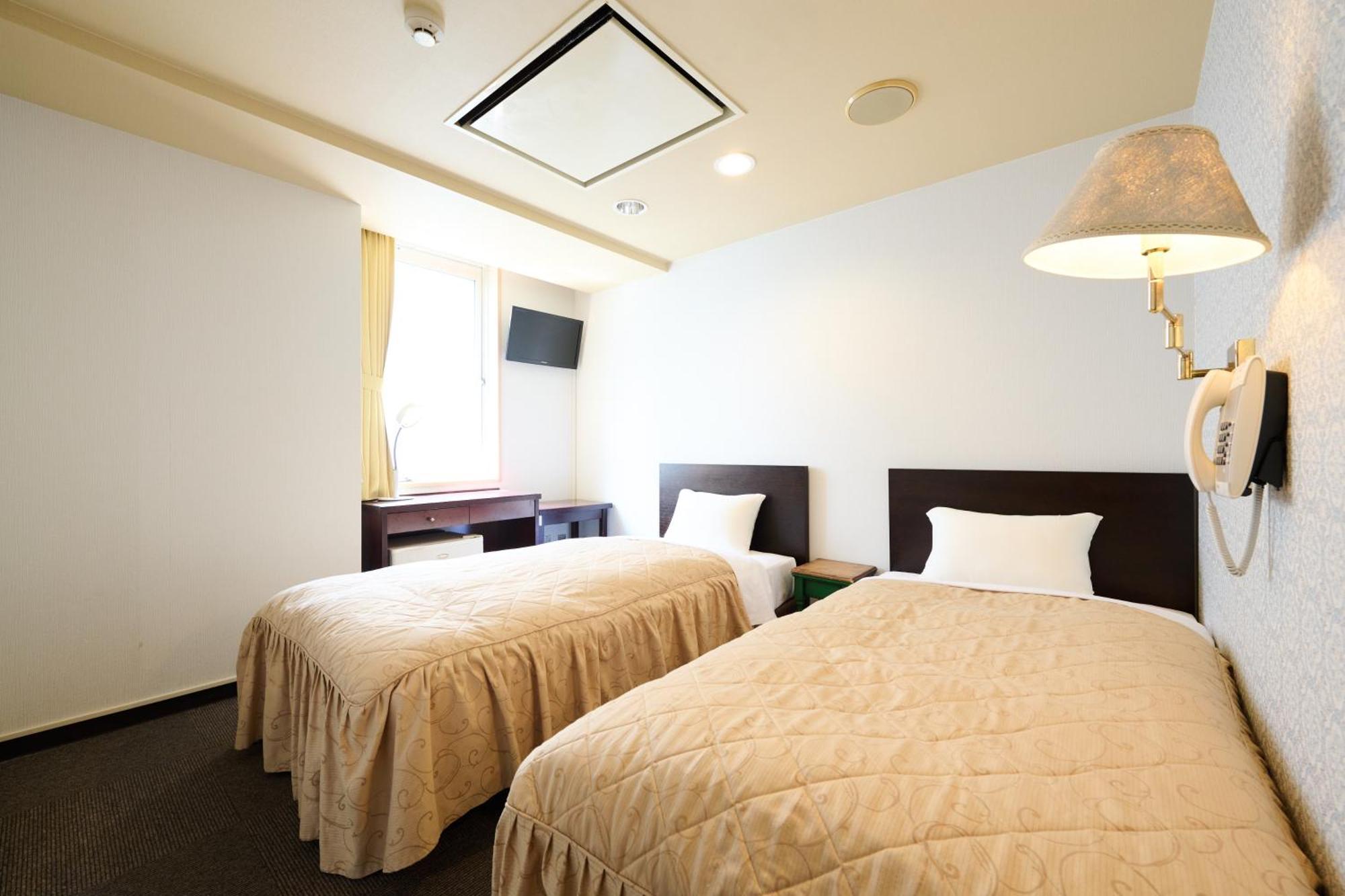 Hotel Sho Sapporo Habitación foto